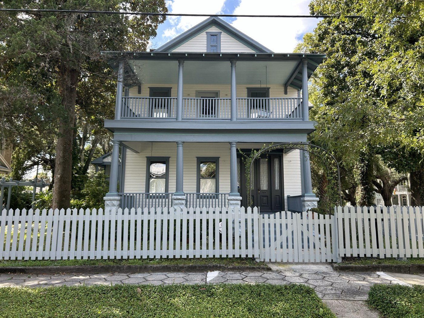 Historic two-story home, painted porches and trim